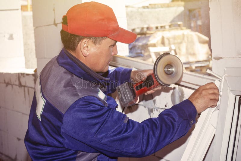 Working installation plastic window working saws building a house stock images
