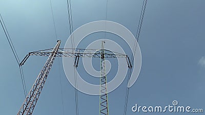 OLOMOUC, CZECH REPUBLIC, APRIL 25, 2018: The male painter is painting an old steel column pole of high electrical stock footage